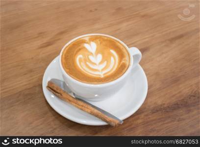 Coffee With Latte Art On Wooden Table, stock photo
