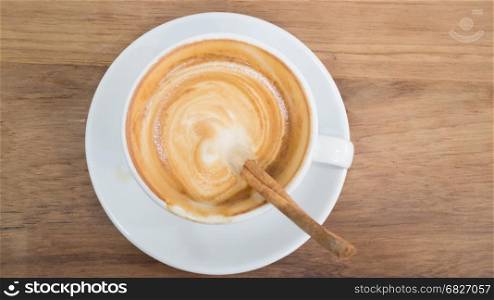 Coffee With Latte Art On Wooden Table, stock photo