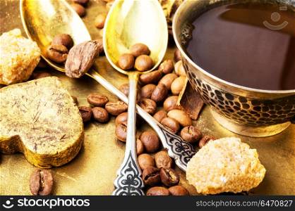 Coffee with sweets. Cup of Turkish coffee and luxury sweets.Coffee drink