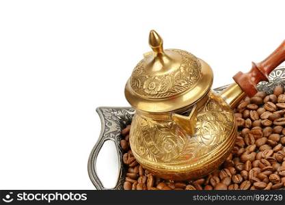 Coffeepot and coffee beans isolated on white background. Free space for text.