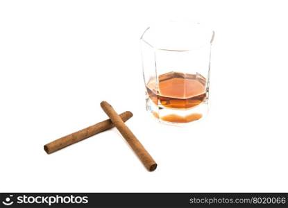 cognac and two cigarillos on white background