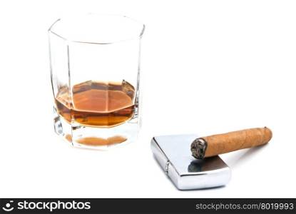 cognac, lighter and cigar closeup on white background