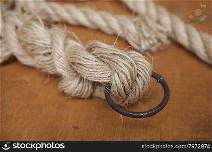 Coil of rope with a marine unit, and an iron ring