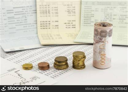 coin, cash and bank book concepts and ideas for saving money,