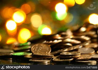 coins and colored bokeh on background