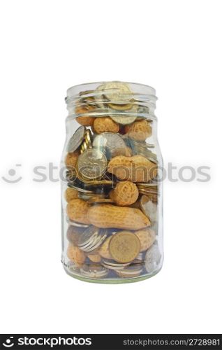 Coins and peanuts in glass jar savings for retirement isolated