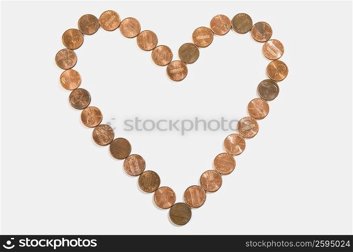 Coins arranged in a heart shape