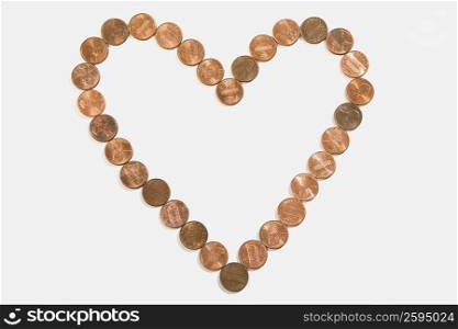 Coins arranged in a heart shape