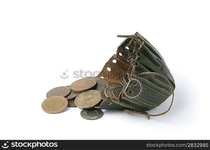 Coins next to old string purse