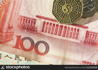 Coins on a Chinese Yuan note with coins
