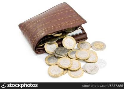 coins spilling out of open leather wallet