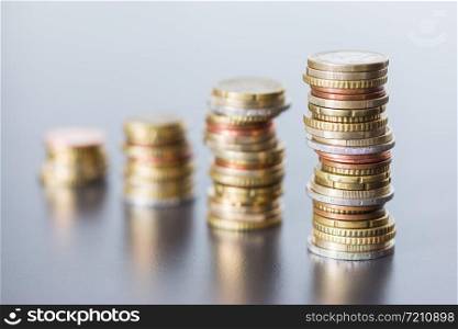 Coins stacked on each other, close up picture, money concept