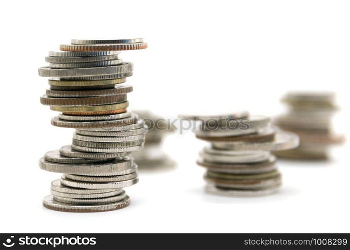 coins stacked on white background