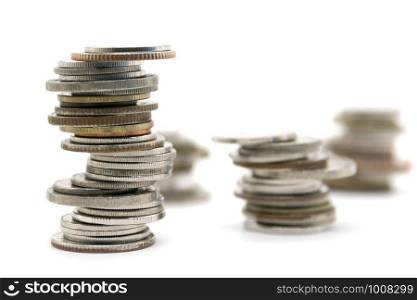 coins stacked on white background