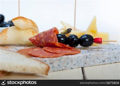 cold cut assortment cheese salami and fresh pears