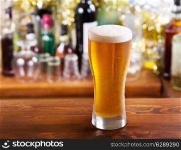 cold glass of beer in a bar