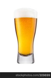 Cold glass of lager beer with foam and dew isolated on white background
