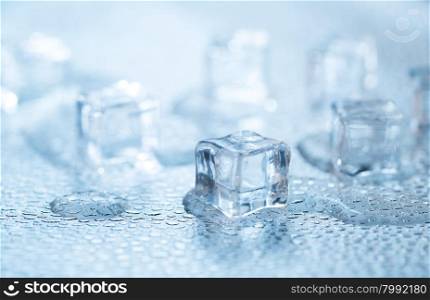 Cold ice cubes with water drops. Cold fresh ice cubes with water drops