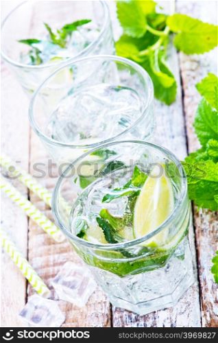 cold mojito in glass and on a table