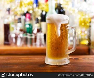 cold mug of beer in bar