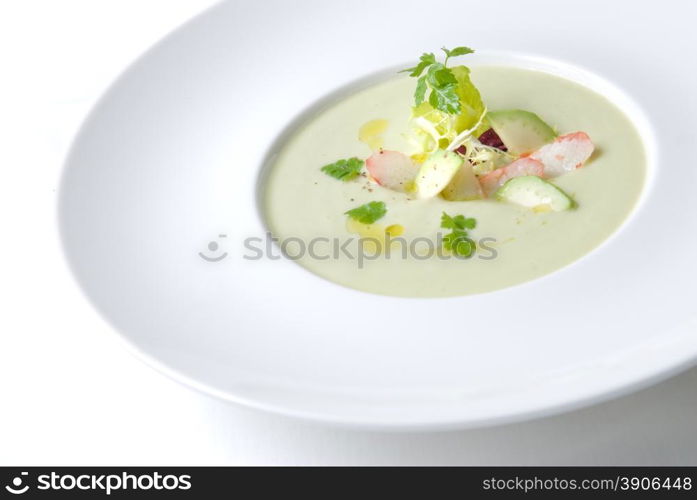 cold soup with crab on the plate