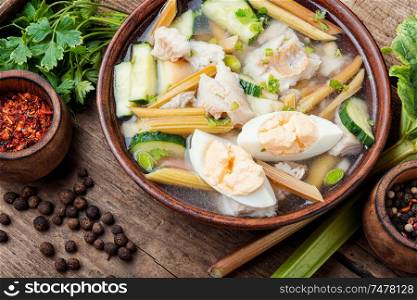 Cold soup with rhubarb and fish.Summer cold soup.. Vegetable soup with fish