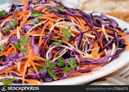 Coleslaw salad of red cabbage with carrots, Celery root