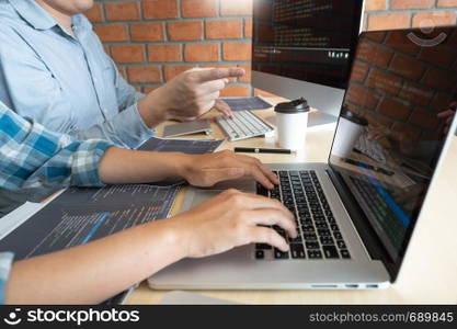 Collaborative work Software engineers website developer technologies or programmer working coding on startup ai application project on screen with partner in coworking space office company