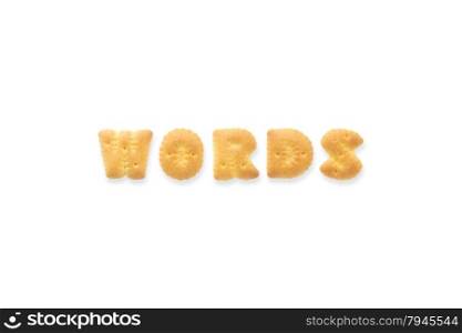 Collage of the capital letters word WORDS. Alphabet cookie biscuits isolated on white background