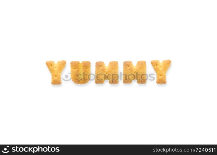 Collage of the character word YUMMY. Alphabet cookie cracker isolated on white background