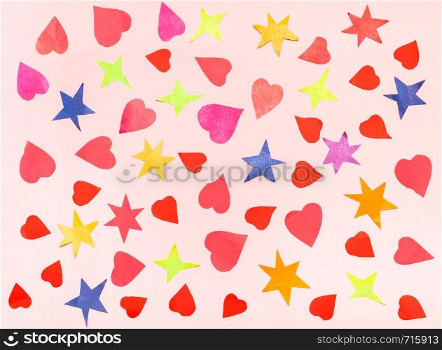 collage of various stars and hearts cut from color papers on pink pastel paper