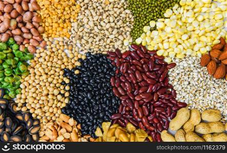 Collage various beans mix peas agriculture of natural healthy food for cooking ingredients / Set of different whole grains beans and legumes seeds lentils and nuts colorful snack texture background