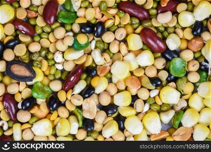 Collage various mix beans peas agriculture of natural healthy food for cooking ingredients / different whole grains mixed beans texture background and legumes seeds lentils and nuts colorful snack