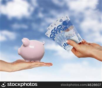 Collage with human hands holding money against blue sky