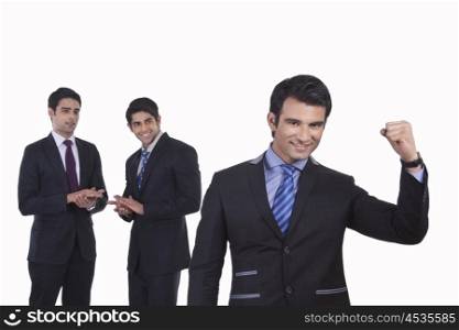 Colleagues clap as fellow businessman rejoices