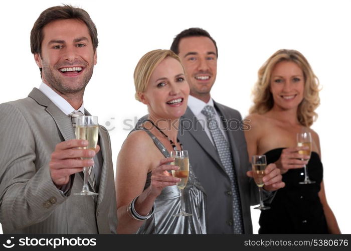 Colleagues drinking champagne