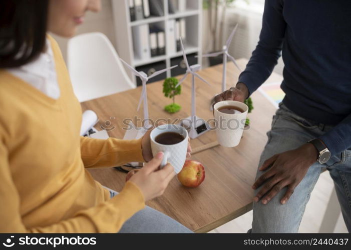 colleagues enjoying cup coffee