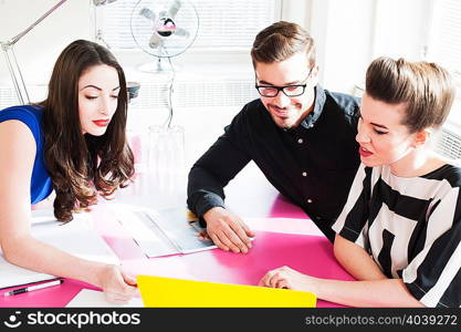 Colleagues in discussion in office