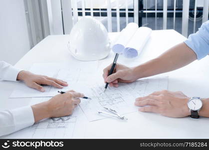 Colleagues interior designer Corporate Achievement Planning Design on blueprint Teamwork Concept with compasses