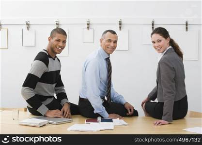 Colleagues sitting on table