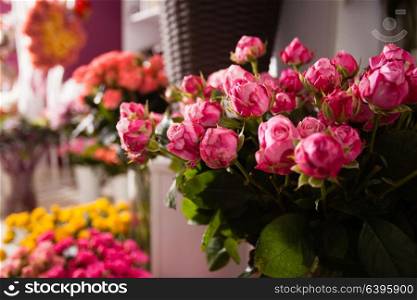 Collection of beautiful roses for sale at a floristic shop. Bouquets roses at a florist&rsquo;s shop