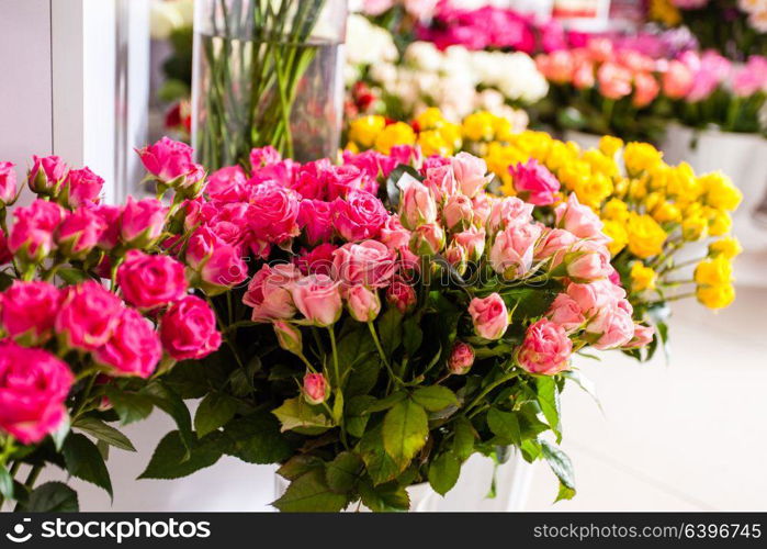 Collection of beautiful roses for sale at a floristic shop. Bouquets roses at a florist&rsquo;s shop