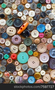 Collection of colorful sewing plastic buttons background