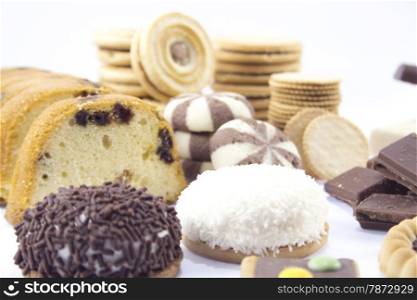 collection of delicious candies, biscuit and Cookies on a white background .