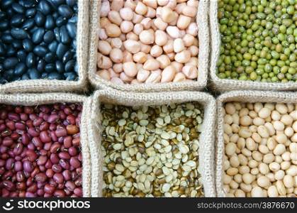 Collection of grain, green bean, red bean, soybean, black bean in bag, cereal product is healthy food, nutrition eating and fibre food