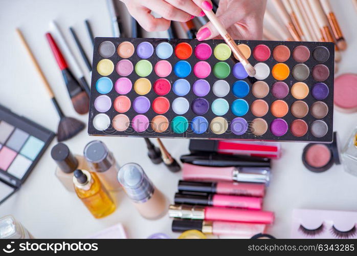 Collection of make up products displayed on the table