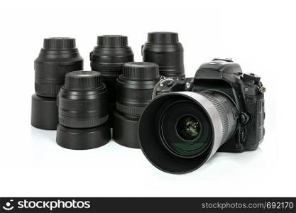 Collection of professional and modern lenses and DSLR camera isolated on a white background in close-up