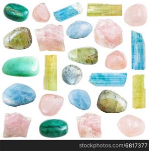 collection of tumbled and cristalline beryl mineral gemstones isolated on white background