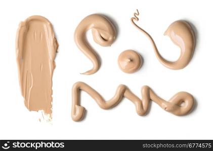 Collection of Various Strokes of Beauty Cream Isolated on White Background