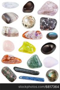 collection of various tumbled mineral stones - labradorite, tholeiite, tholeite, eclogite, rhyolite, jadeite, morganite, petalite, castorite, kyanite, charoite, tinaksite, lizardite, hornblende, etc